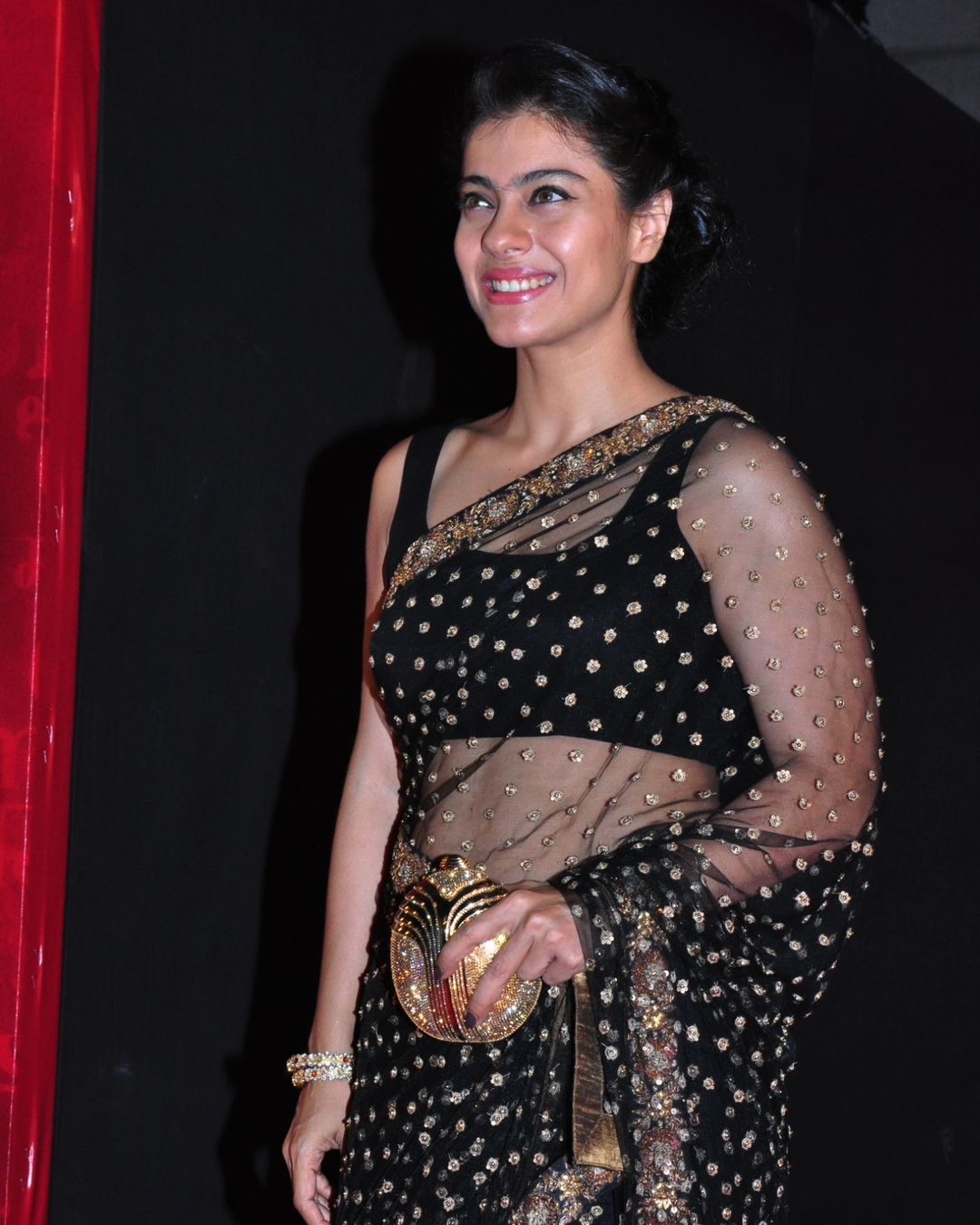 Bollywood Actress Kajol Devgan in Sleeveless Black Saree